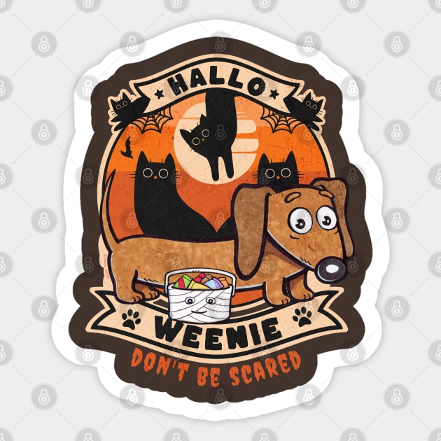 Cute and Funny Doxie Dachshund dog the Halloweenie going trick or treating on Halloween with cats saying Don't be scared Sticker by Danny Gordon Art